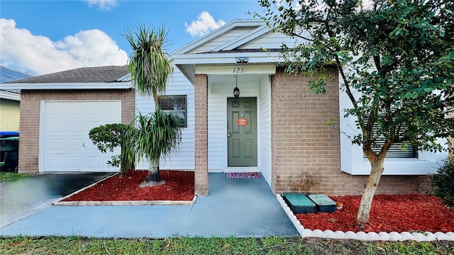 view of front of property featuring a garage