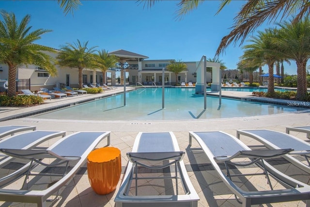 view of swimming pool with a patio