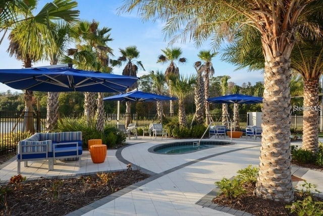 view of swimming pool featuring a patio