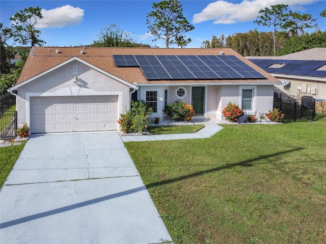 single story home featuring solar panels, a front lawn, and a garage