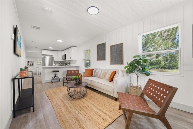 living room featuring light wood-type flooring