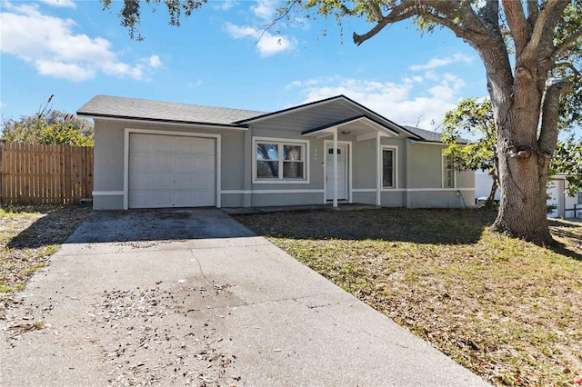 single story home with a garage