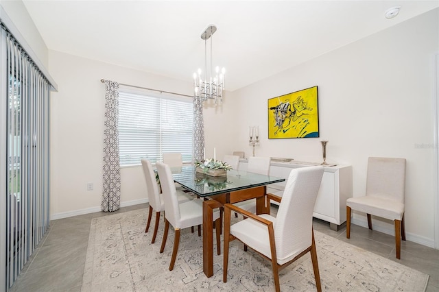 dining space featuring an inviting chandelier