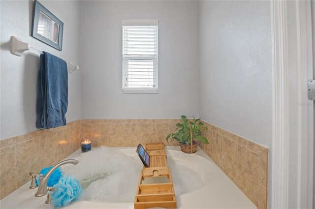 bathroom with a washtub