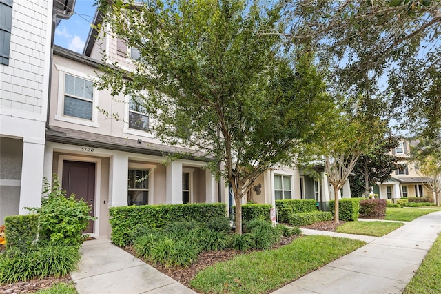 view of property with stucco siding