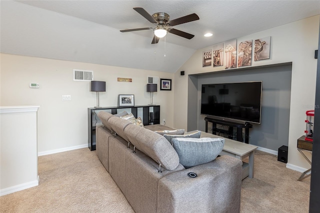 living area featuring a ceiling fan, light colored carpet, lofted ceiling, and baseboards