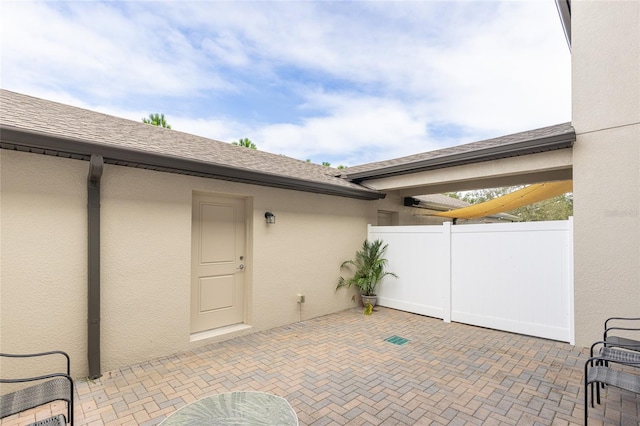 view of patio / terrace with fence