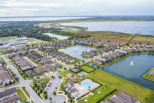 drone / aerial view with a water view