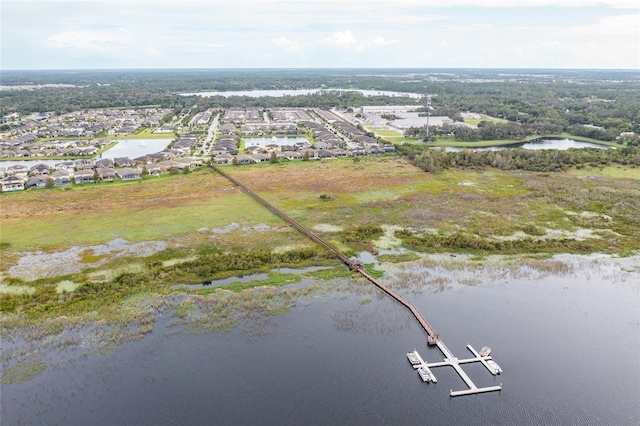 aerial perspective of suburban area featuring a large body of water
