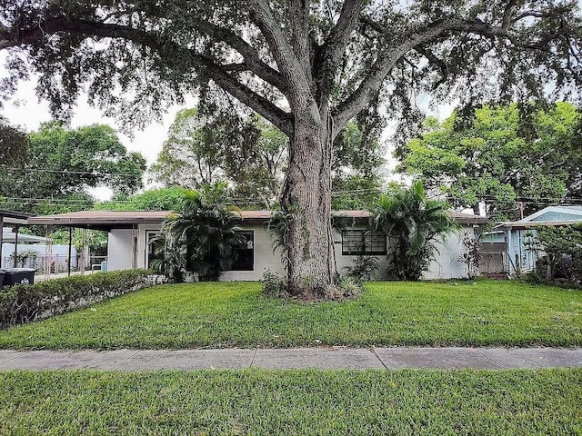 view of front of home with a front yard