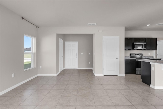 interior space featuring light tile patterned flooring