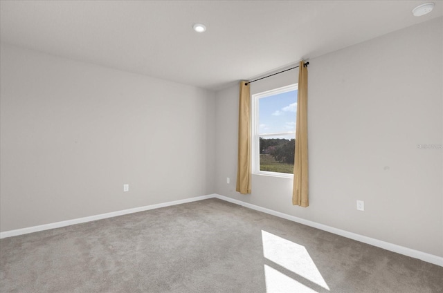 view of carpeted spare room