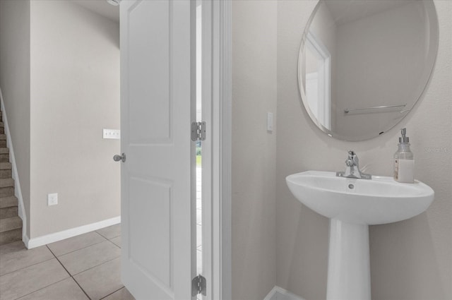 bathroom with tile patterned flooring