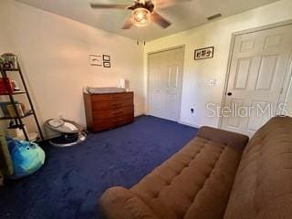 bedroom featuring ceiling fan and carpet flooring