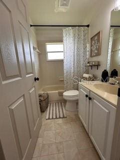 full bathroom featuring vanity, shower / bath combination with curtain, and toilet