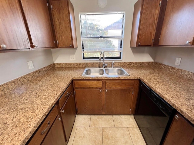 kitchen with light tile patterned floors, sink, and dishwasher