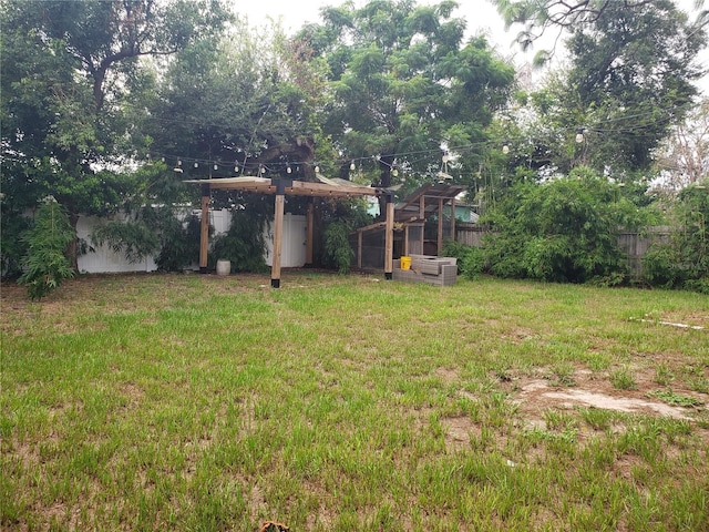 view of yard with fence