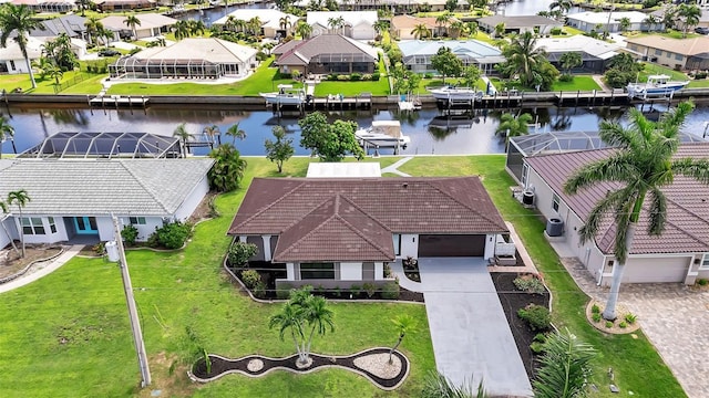 bird's eye view with a water view