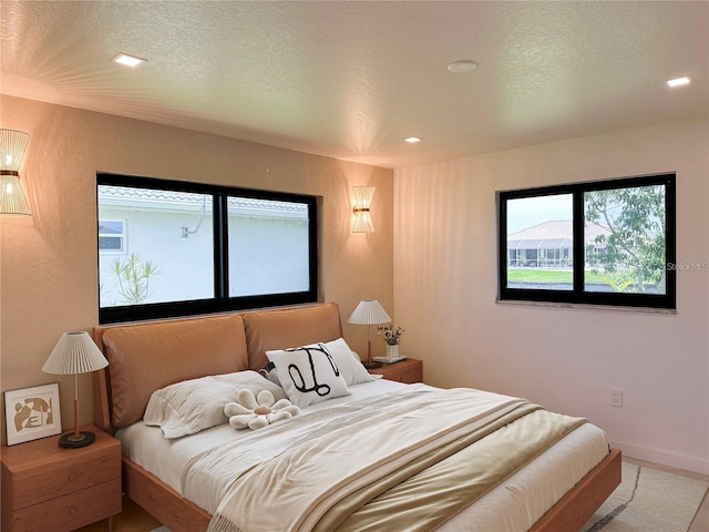 bedroom featuring a textured ceiling