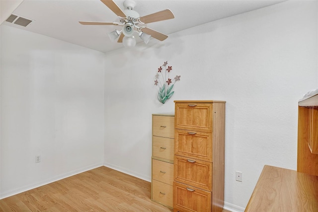 interior space featuring ceiling fan and light wood-type flooring