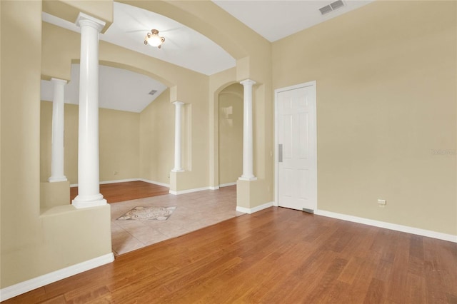 empty room with hardwood / wood-style floors