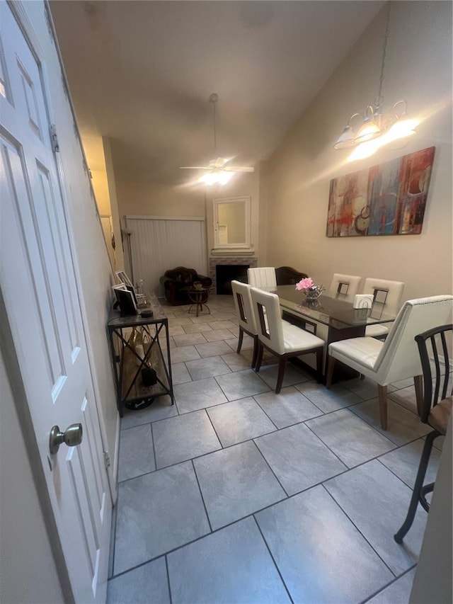 dining area featuring tile patterned flooring and ceiling fan