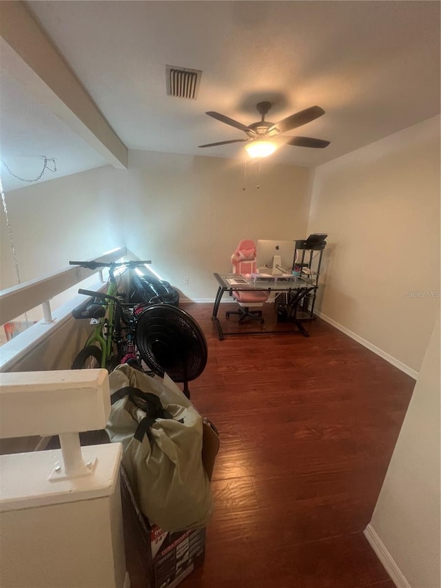 dining space featuring visible vents, wood finished floors, beam ceiling, baseboards, and ceiling fan