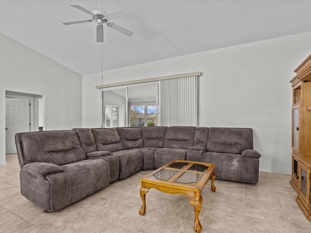 tiled living room with lofted ceiling, a textured ceiling, and ceiling fan