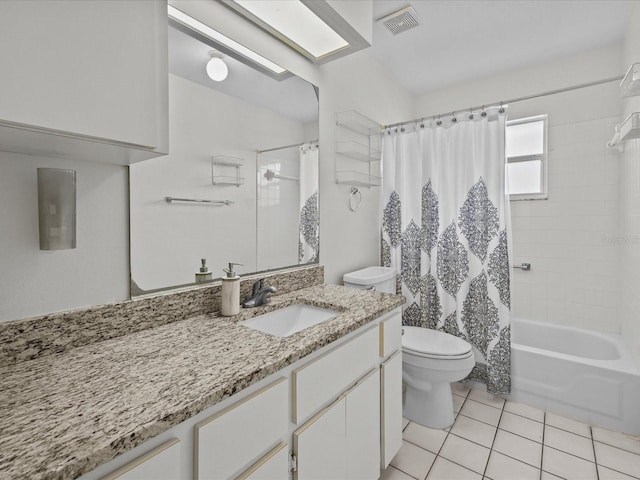 full bathroom featuring vanity, toilet, shower / bathtub combination with curtain, and tile patterned flooring