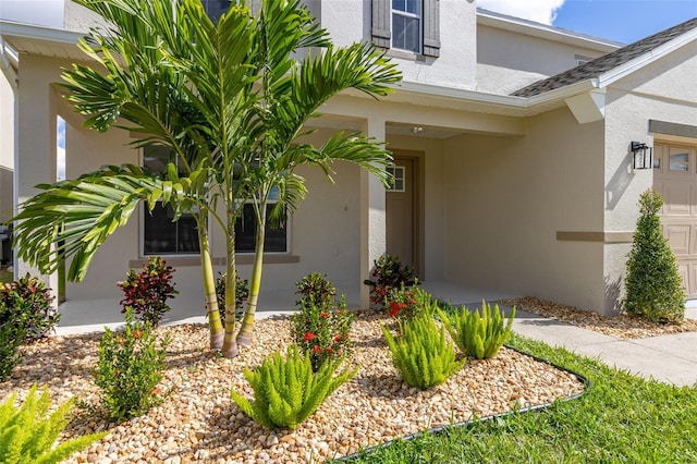 property entrance with a garage