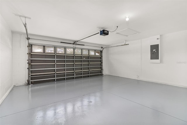 garage featuring a garage door opener and electric panel