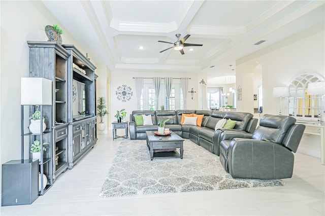 living room featuring ceiling fan, coffered ceiling, beamed ceiling, and crown molding