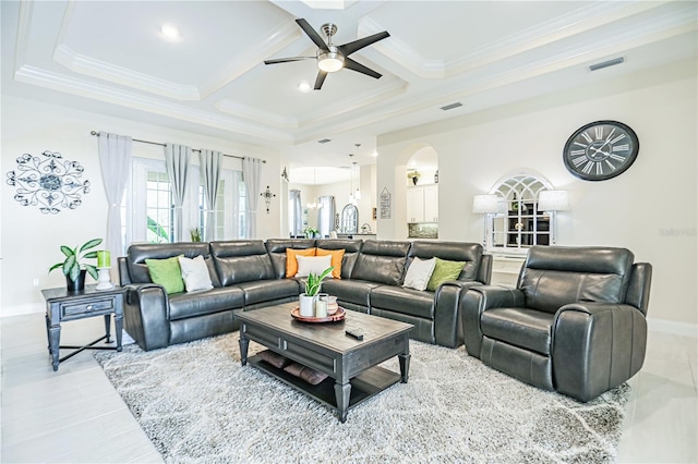 living room featuring ceiling fan, coffered ceiling, beam ceiling, and crown molding