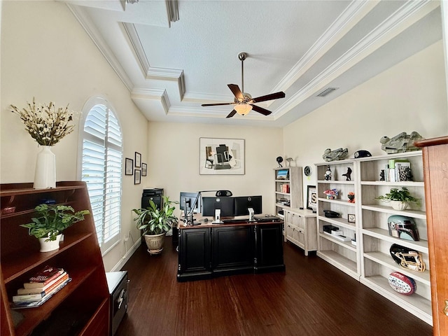 office space featuring a textured ceiling, a tray ceiling, dark hardwood / wood-style flooring, ceiling fan, and crown molding