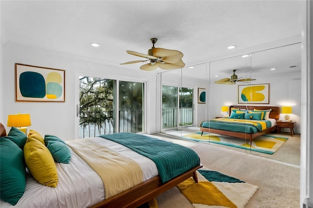 bedroom featuring ceiling fan, access to exterior, and carpet flooring