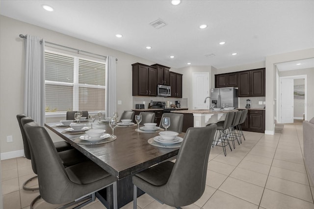365 Southfield St, Kissimmee, FL 34747 - dining room featuring light tile patterned floors and recessed lighting