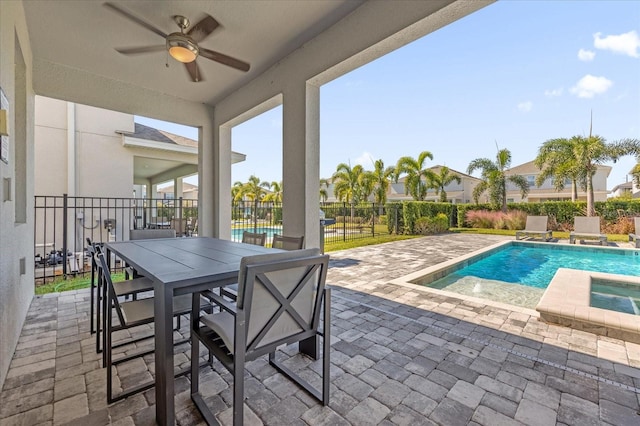 view of swimming pool featuring a patio and ceiling fan