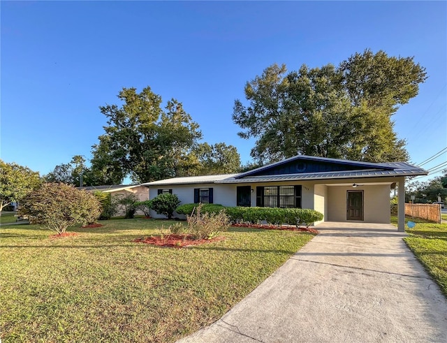 single story home with a front yard