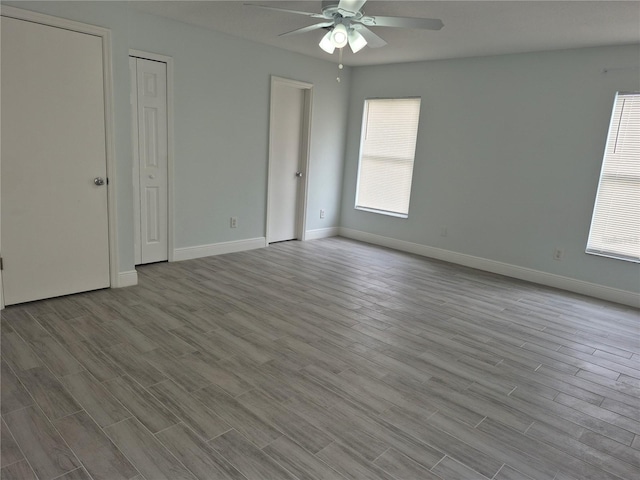 unfurnished bedroom with light hardwood / wood-style flooring and ceiling fan