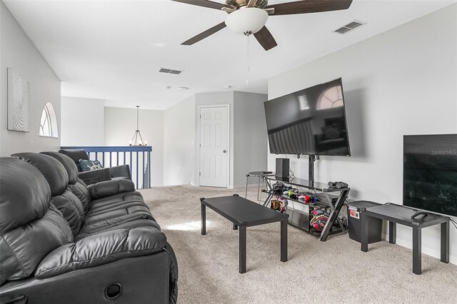 living room featuring light colored carpet and ceiling fan