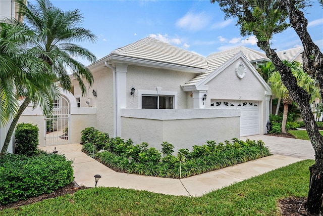 view of front of home with a garage