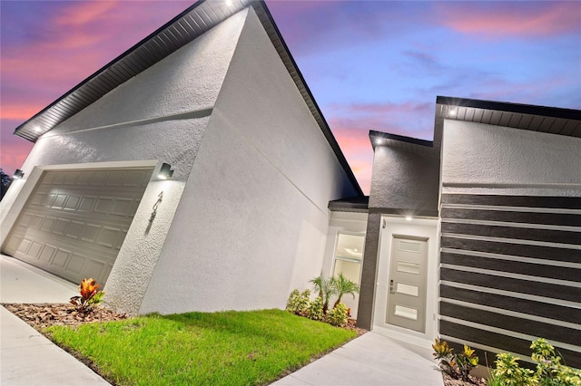 1877 Snapper Dr, Kissimmee, FL 34759 - view of front of home featuring stucco siding