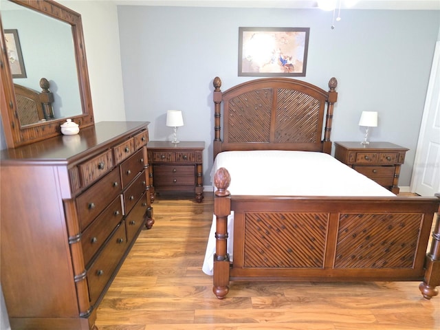 bedroom featuring light wood-type flooring