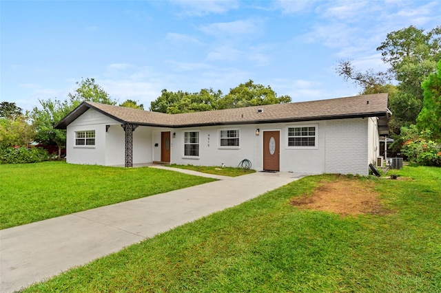 ranch-style house with a front lawn