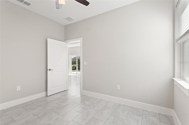 empty room featuring ceiling fan