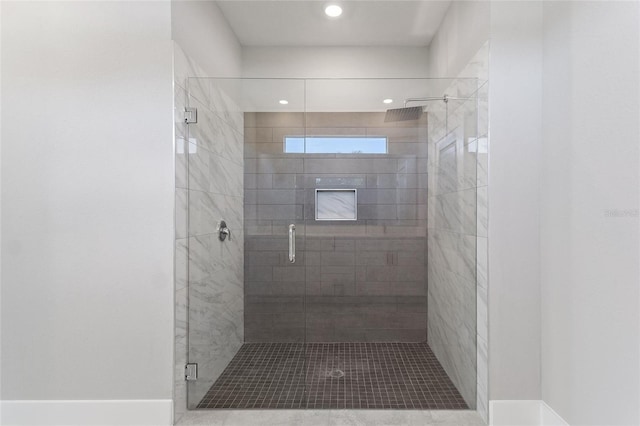 bathroom featuring an enclosed shower