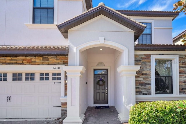 property entrance featuring a garage