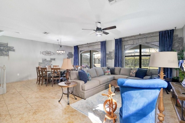 living room with ceiling fan