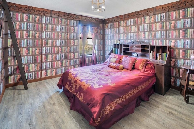 bedroom with wood-type flooring