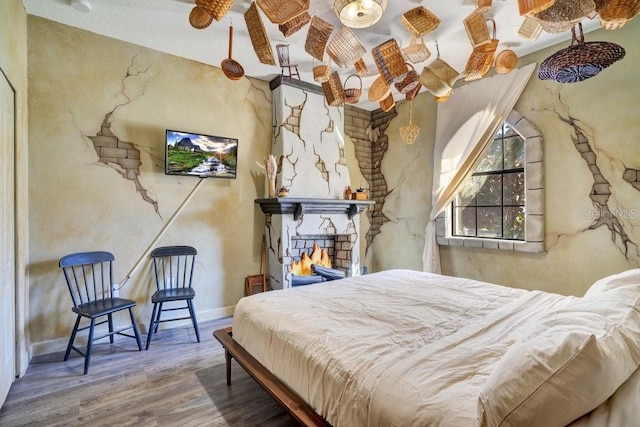 bedroom featuring hardwood / wood-style flooring